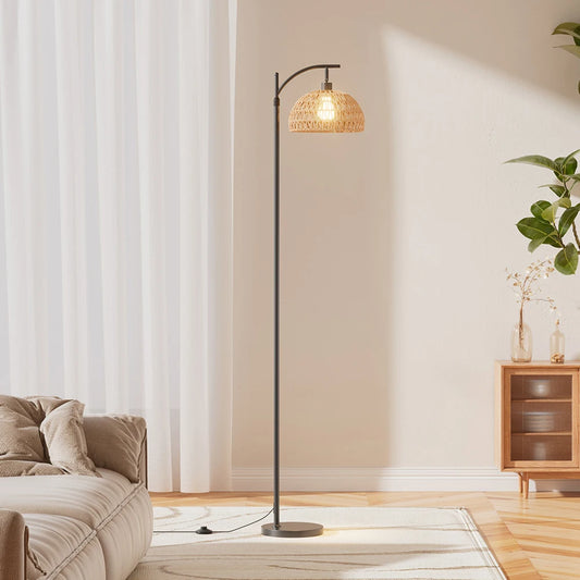 Floor lamp in a living room setting with a couch and cabinet.