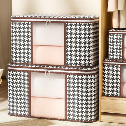 Houndstooth patterned storage boxes with white interior compartments on a wooden shelf.