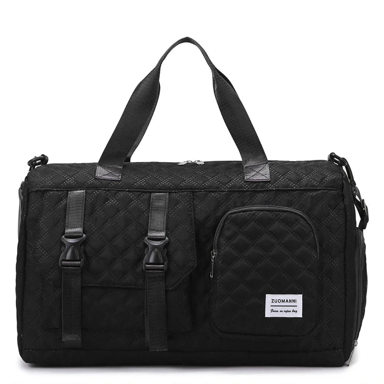 Black duffel bag with quilted pattern on a white background