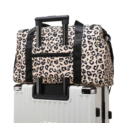 Leopard print duffel bag on a white background