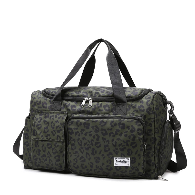 Leopard print duffel bag with multiple pockets and a brand logo on a white background