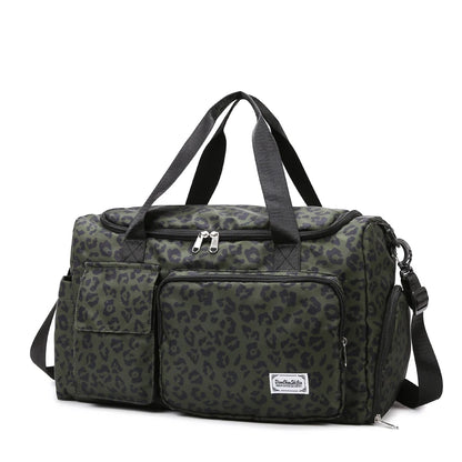 Leopard print duffel bag with multiple pockets and a brand logo on a white background