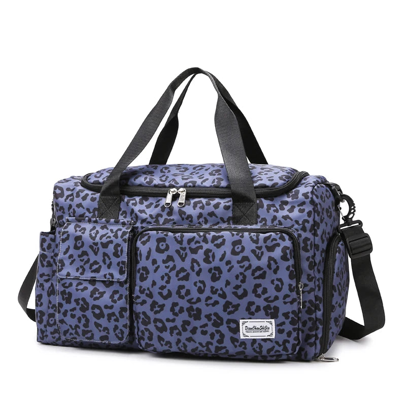 Blue leopard print bag with black straps on a white background