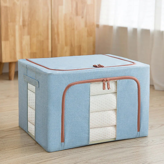 Blue storage box with a transparent lid on a wooden floor