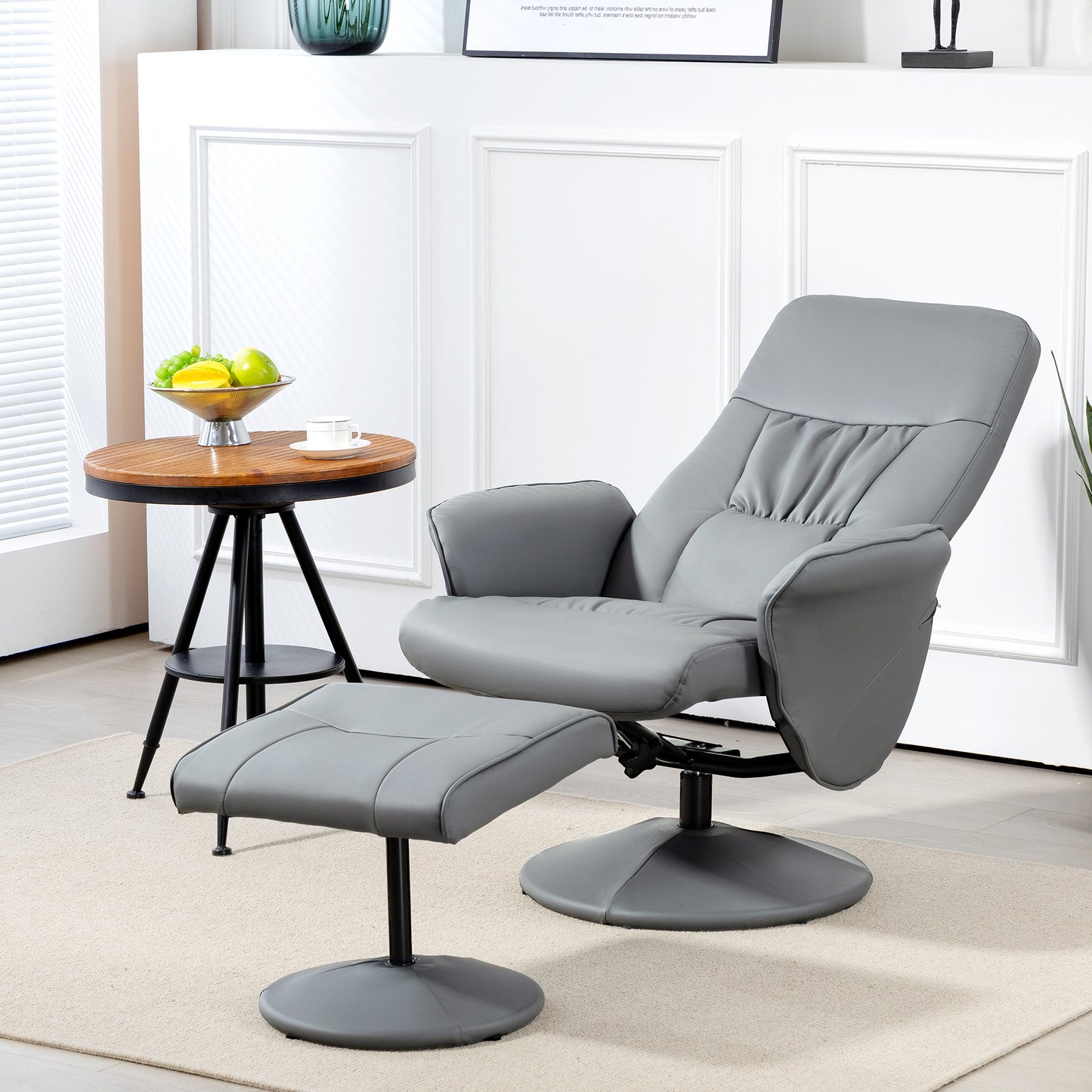 Gray recliner chair with ottoman in a room setting