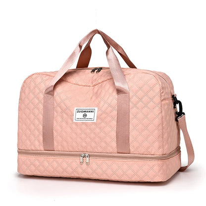 Pink quilted duffel bag with 'Zuoman' brand label on a white background