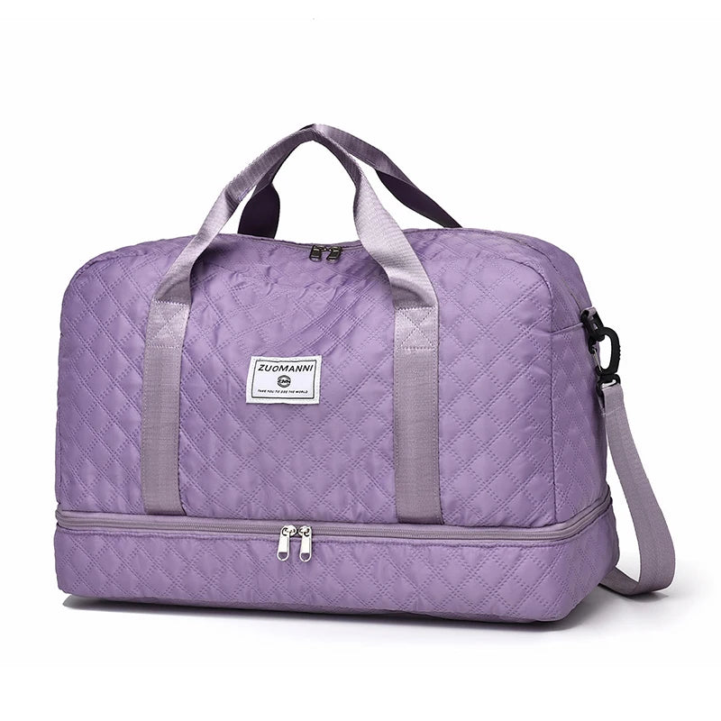 Purple travel bag with gray straps on a white background