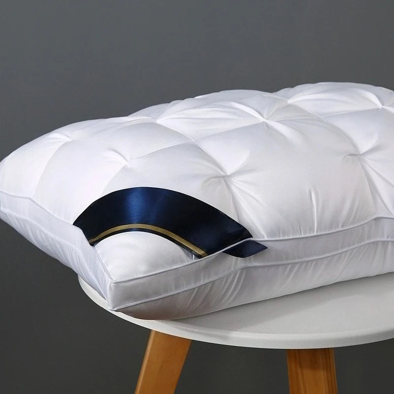 White pillow with a blue accent on a gray background