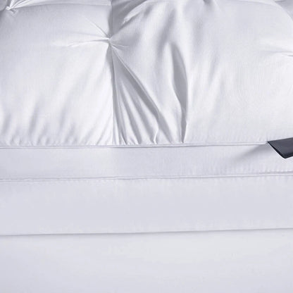 Close-up of a white satin fabric with folds
