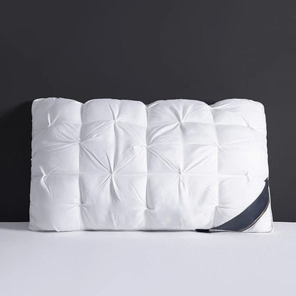 White quilted pillow on a dark background