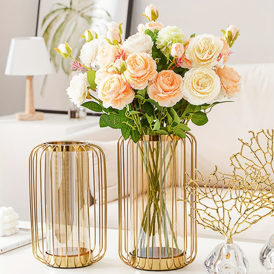 Gold wire vases with flowers on a decorative table