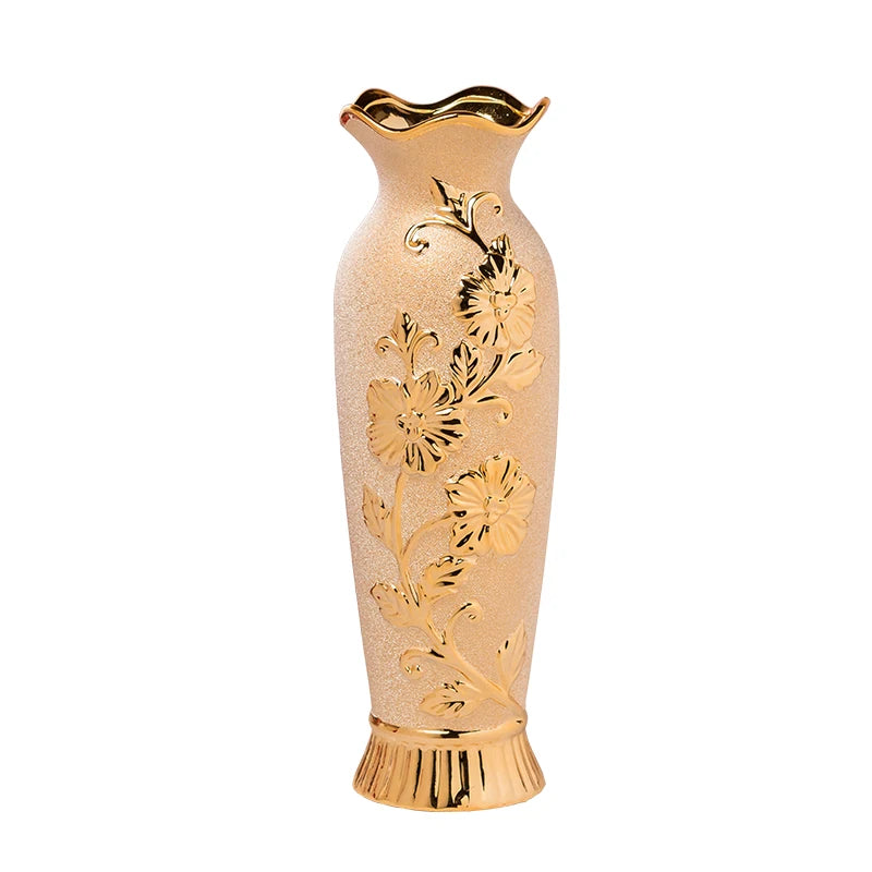 Decorative vase with gold floral patterns on a white background
