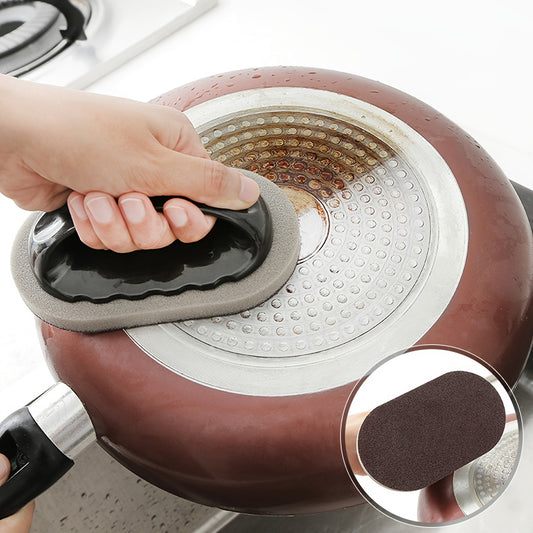 Person using a silicone trivet to handle a hot pot