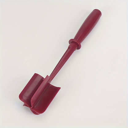 Red plastic tool on a white background