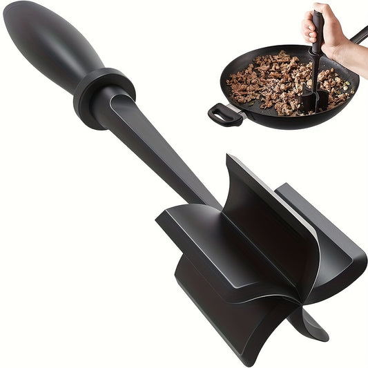 Black meat tenderizer tool with a pan of cooked meat on a white background
