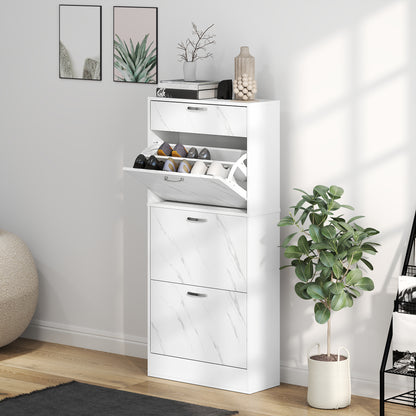 White shoe cabinet with open door showing shoes, next to a potted plant in a room.