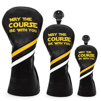 Black golf club head covers with yellow text 'May the Course Be With You' on a white background