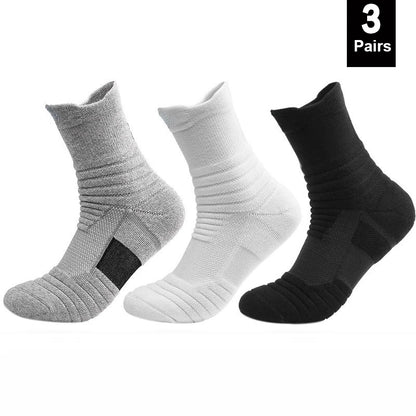 Three pairs of socks in gray, white, and black on a white background