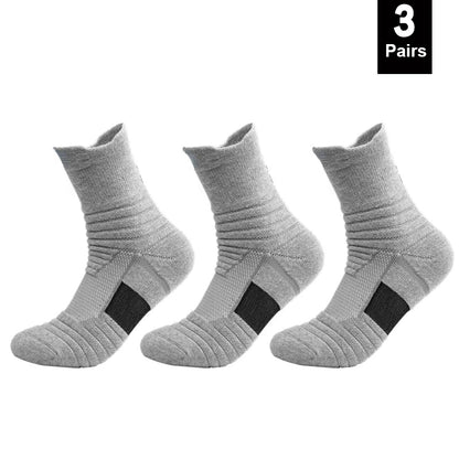 Three pairs of gray socks with black accents on a white background