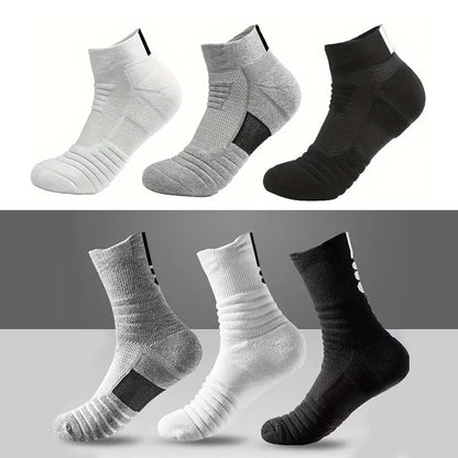 Set of six pairs of socks in white, gray, and black on a gradient background.