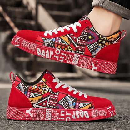 Red sneakers with colorful geometric pattern and text on a blurred background