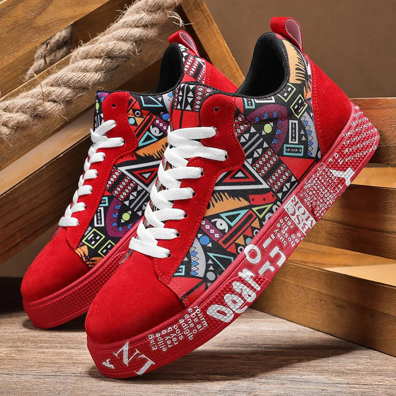 Red sneakers with a colorful geometric pattern on a wooden floor