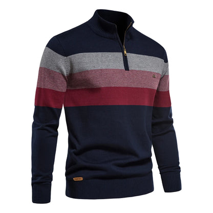 Navy, gray, and red striped sweater on a white background