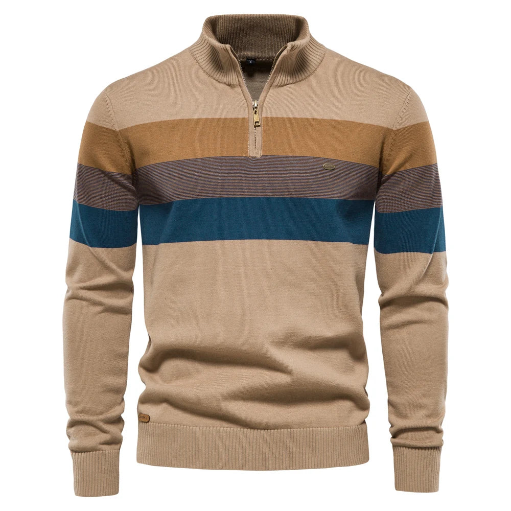 Beige sweater with brown and blue stripes on a white background