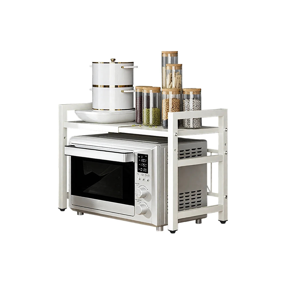 Kitchen cart with microwave, bowls, and storage jars on a white background
