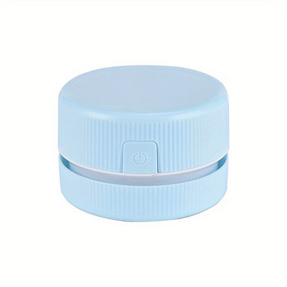 Light blue cylindrical device with power button on a white background