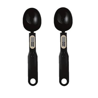 Two black digital measuring spoons on a white background