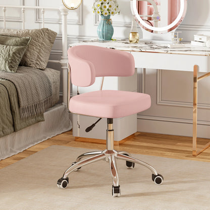 Pink office chair in a room with a desk and decorative items.