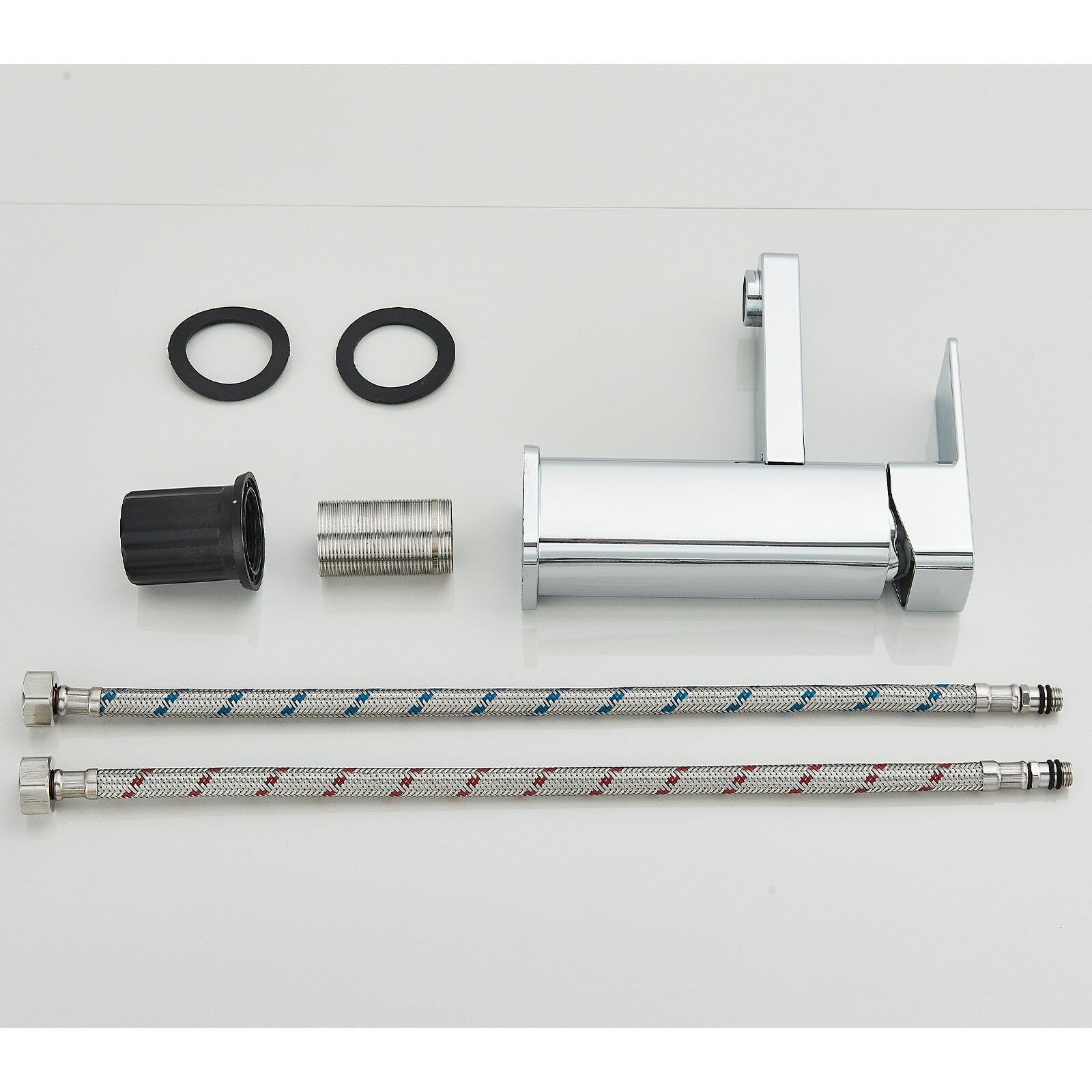 Set of plumbing components including a hose, connectors, and a valve on a white background