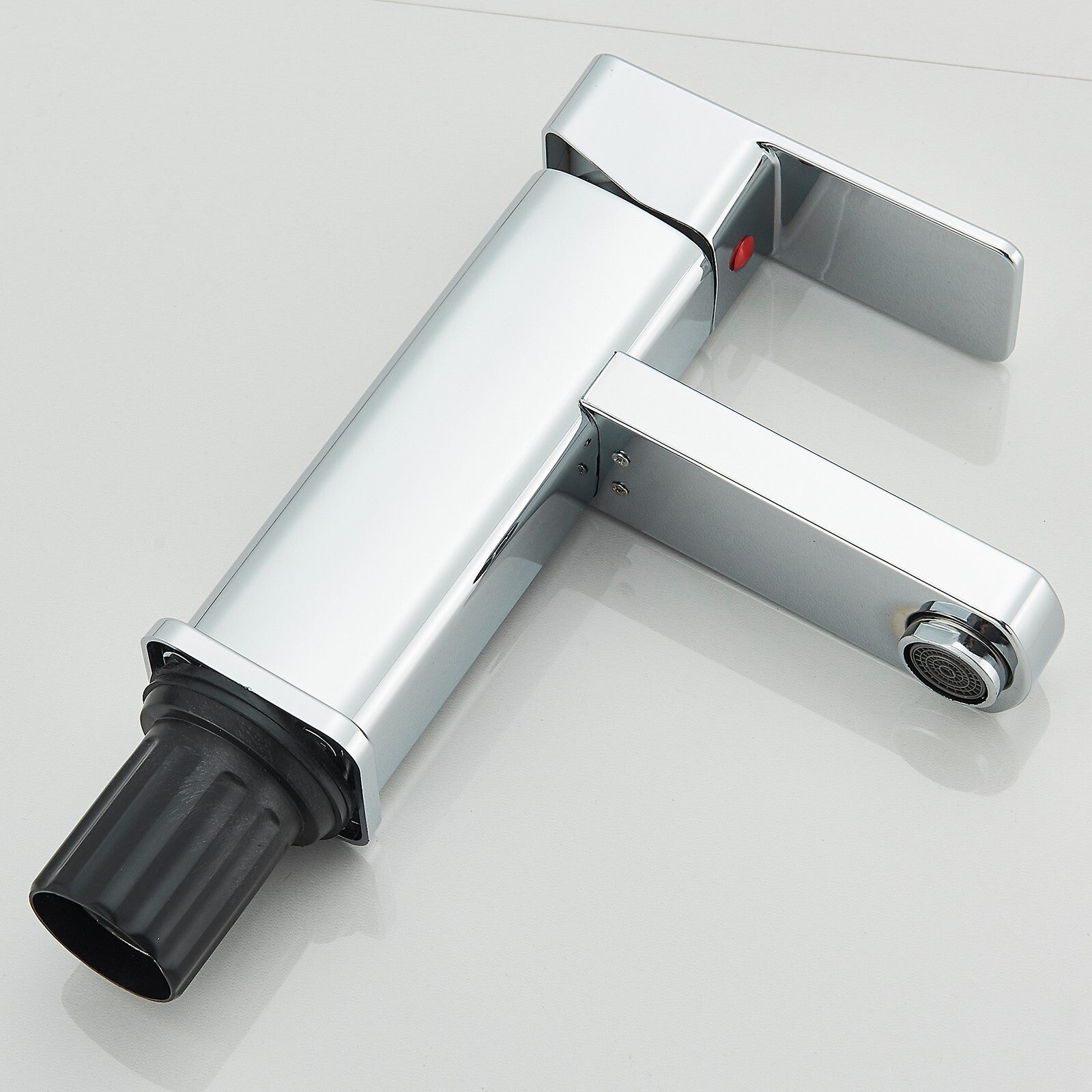 Chrome bathroom faucet on a white background