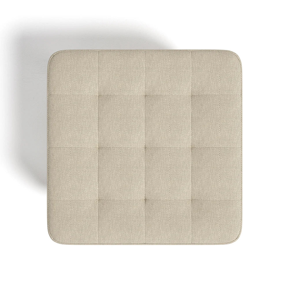 Beige square cushion on a white background