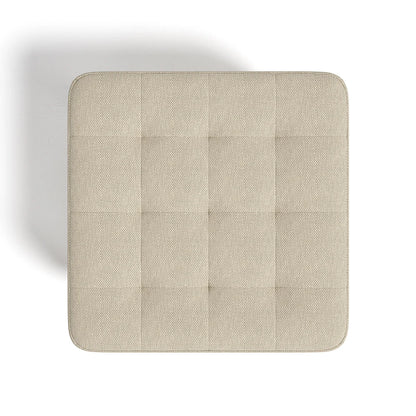 Beige square cushion on a white background