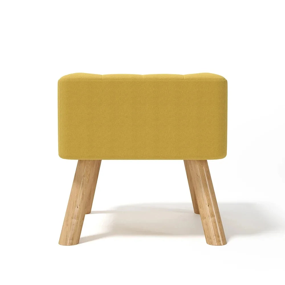 Yellow stool with wooden legs on a white background
