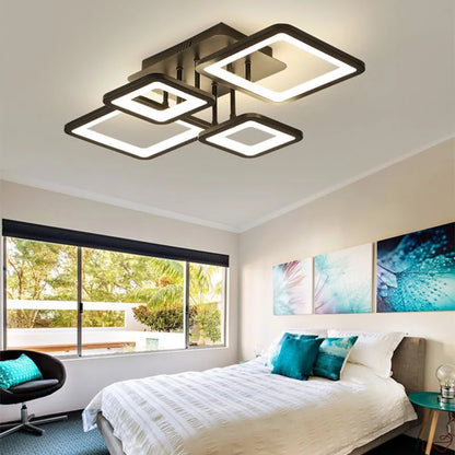 Modern ceiling light fixture in a bedroom with a bed and decor.