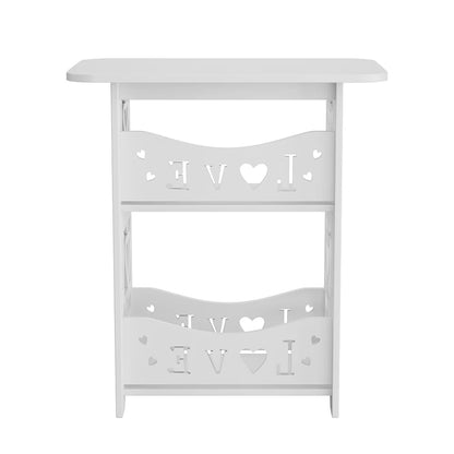 White side table with decorative cutouts on a white background