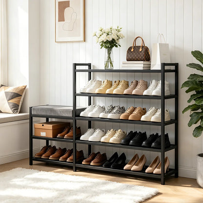 Black shoe rack with various shoes on shelves in a room with decor elements.