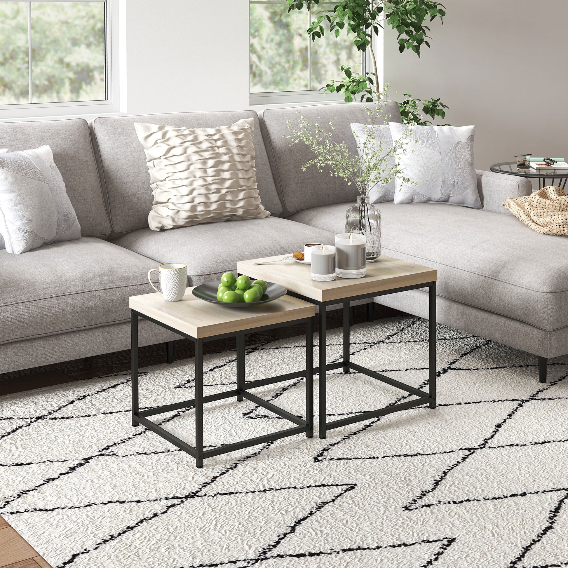 Living room with a gray sectional sofa, coffee table, and decorative items.