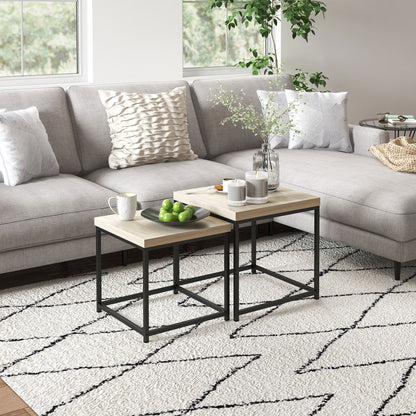 Living room with a gray sectional sofa, coffee table, and decorative items.