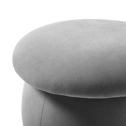 Close-up of a gray upholstered chair with a white background