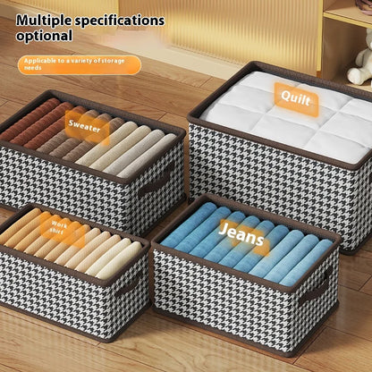 Four storage bins with labels for different types of clothing on a wooden floor.