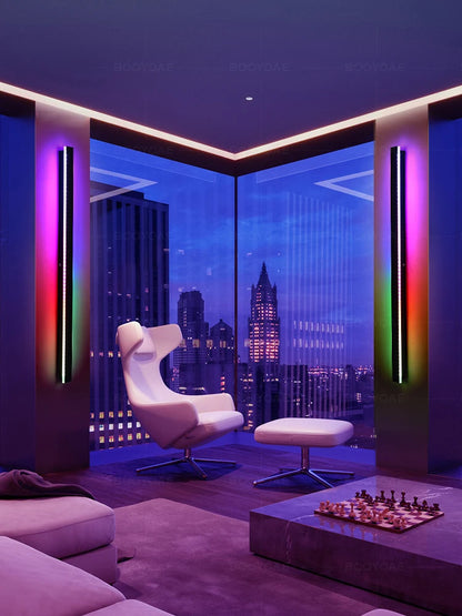 Modern room with a cityscape view, futuristic chair, and neon lights.