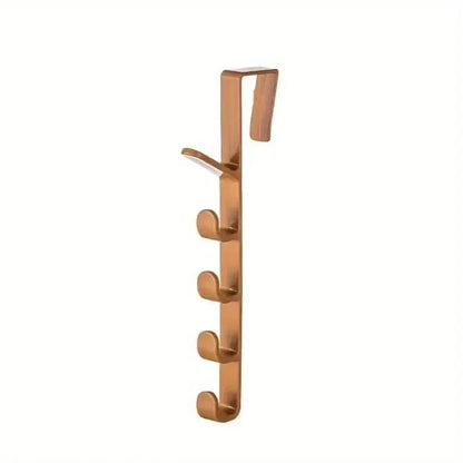 Copper over-the-door hook rack on a white background