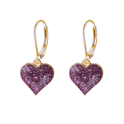 Heart-shaped purple glitter earrings with gold hooks on a white background