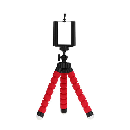 Red and black flexible tripod with smartphone holder on a white background