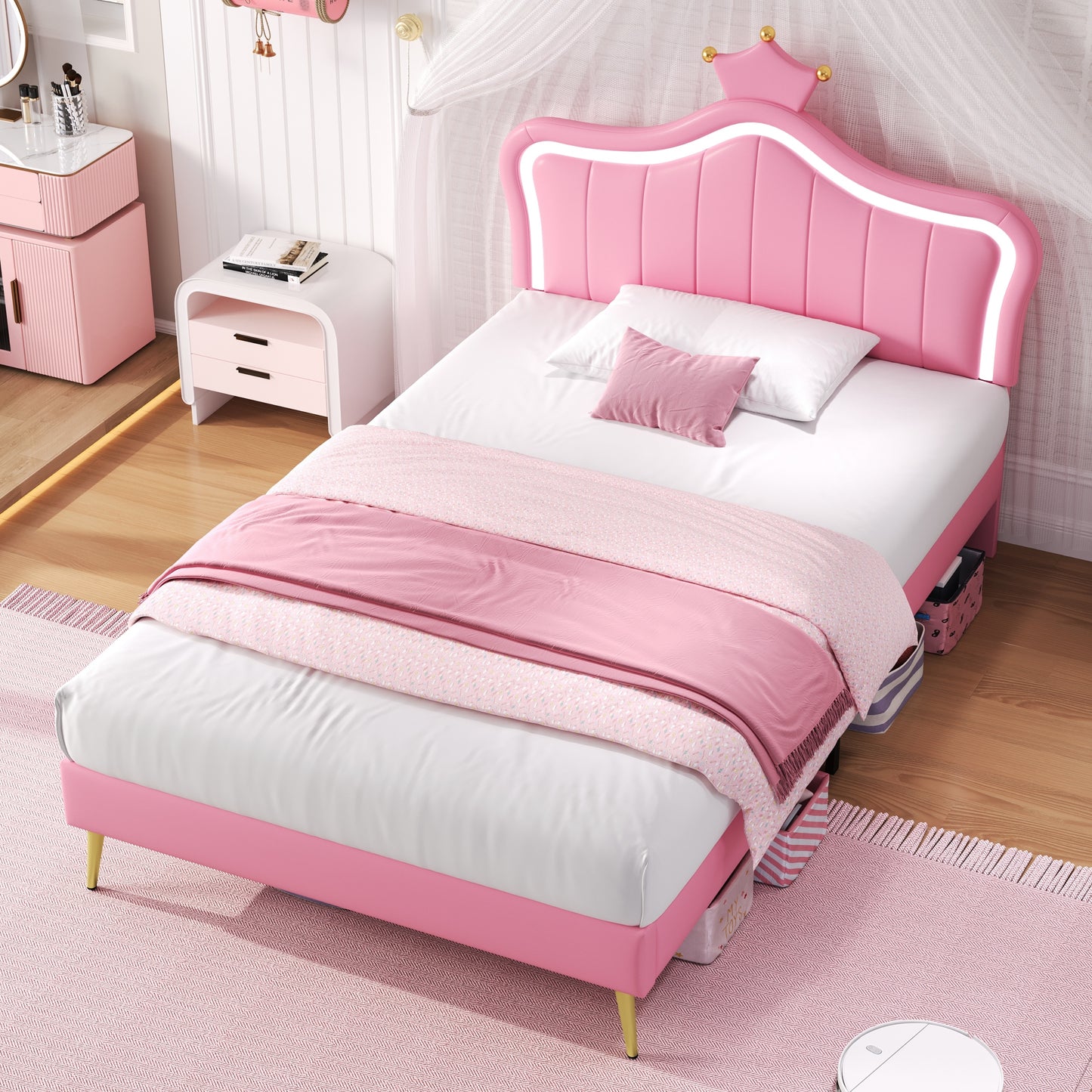 Pink bed with princess headboard in a bedroom setting