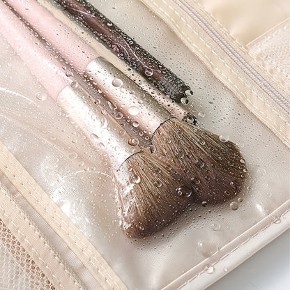 Makeup brushes with water droplets on a clear plastic surface